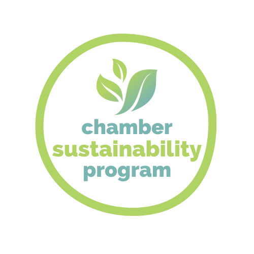 Green circle enclosing leaves and the words chamber sustainability progam.